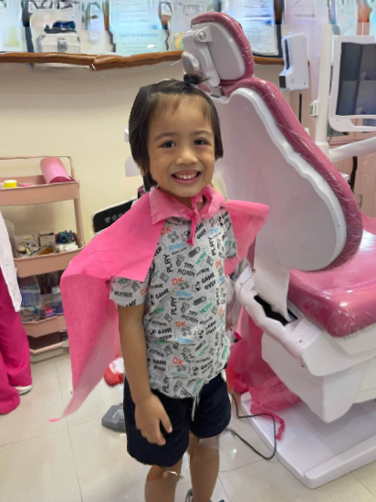 Caring Filipino Dentist with Patient at Fradejas Dental Care Clinic in Odiongan
